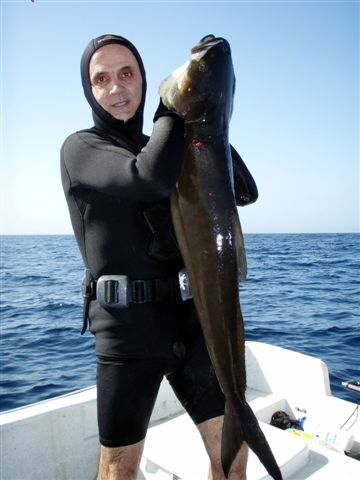 Ric and cobia.JPG
